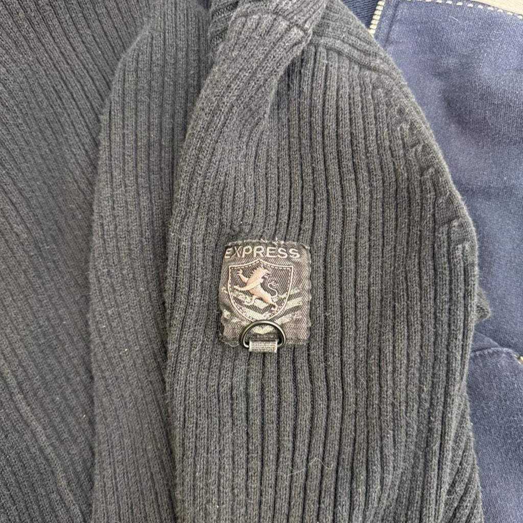 Y2K Express charcoal gray ribbed quarter zip sweater featuring a sleek fitted silhouette and mock neck. A timeless early 2000s essential that's perfect for layering with low-rise jeans, cargos, or skirts for a clean casual look.