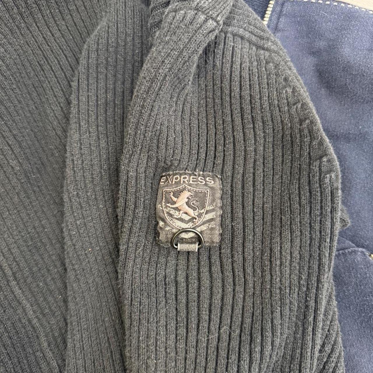 Y2K Express charcoal gray ribbed quarter zip sweater featuring a sleek fitted silhouette and mock neck. A timeless early 2000s essential that's perfect for layering with low-rise jeans, cargos, or skirts for a clean casual look.