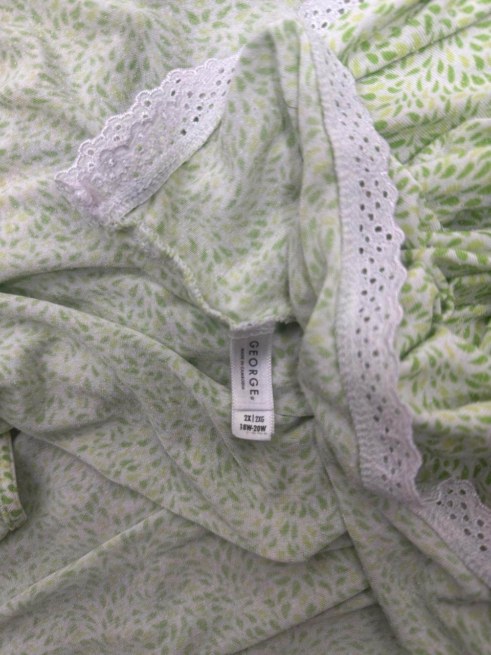 Fairycore Y2K George light green floral lace trim tank top featuring a soft allover leaf print, decorative button front, and delicate eyelet lace details. A cute everyday layering piece that's perfect for spring, cottagecore, or casual Y2K outfits.