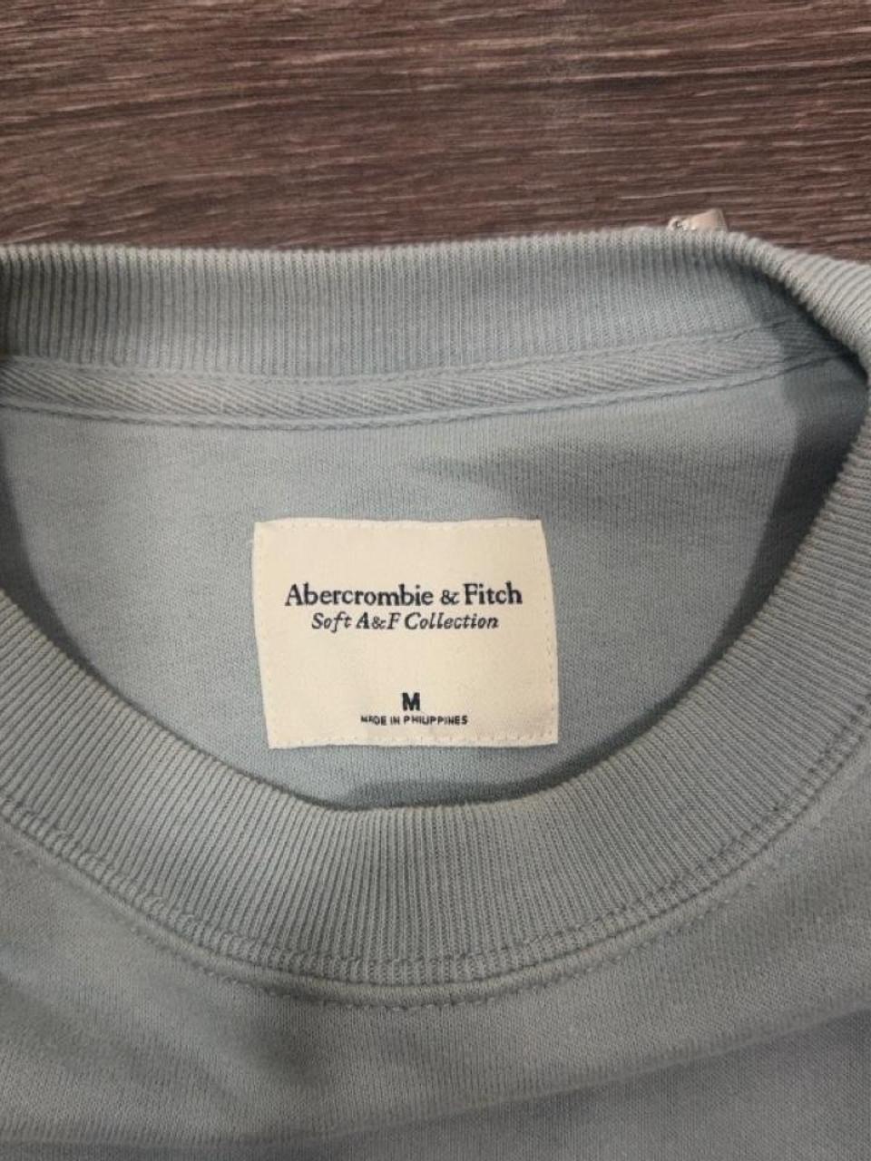 Y2K Abercrombie & Fitch sage green crewneck sweatshirt featuring a soft fleece interior and relaxed everyday fit. A clean minimalist essential that's perfect for layering with low-rise jeans, cargos, or leggings for an effortless casual Y2K look.