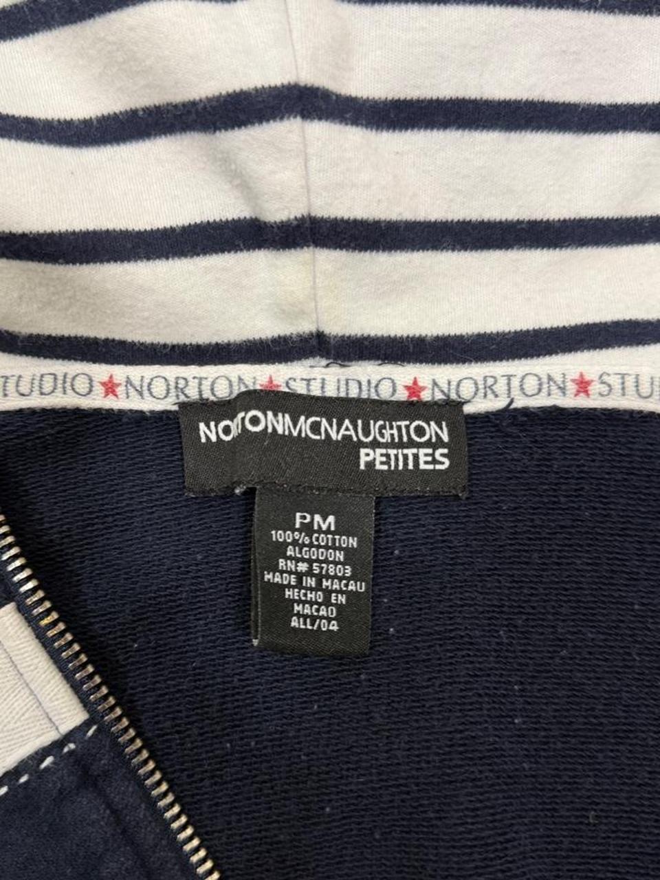 Y2K Studio Norton navy zip-up hoodie featuring sporty white stripe details, red embroidered stars, and a cozy hood with adjustable drawstrings. A classic early 2000s layering piece that's perfect with jeans, cargos, or athleisure looks.