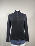 Y2K Express charcoal gray ribbed quarter zip sweater featuring a sleek fitted silhouette and mock neck. A timeless early 2000s essential that's perfect for layering with low-rise jeans, cargos, or skirts for a clean casual look.